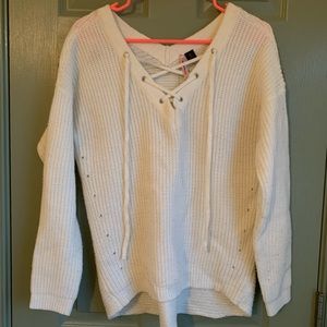 White sweater with lace up detail